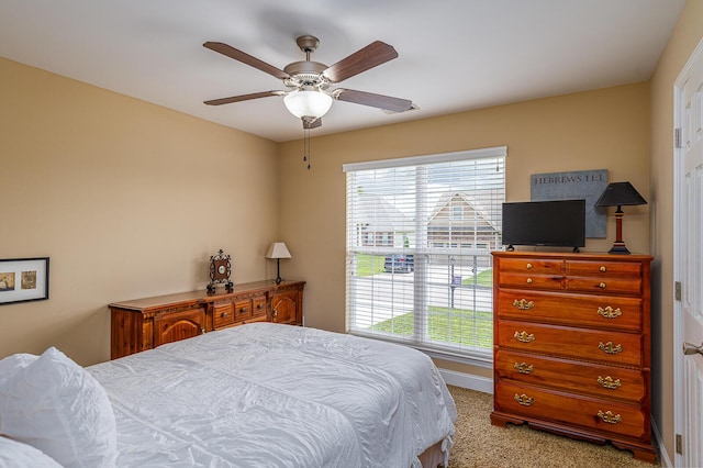 8337 Kayla Rose Cir, Ooltewah, TN 37363 - bedroom with multiple windows, light colored carpet, and a ceiling fan
