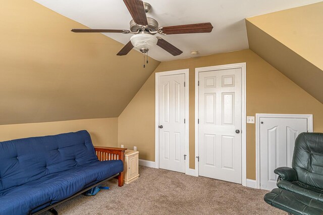 8337 Kayla Rose Cir, Ooltewah, TN 37363 - living area featuring light colored carpet, a ceiling fan, and vaulted ceiling