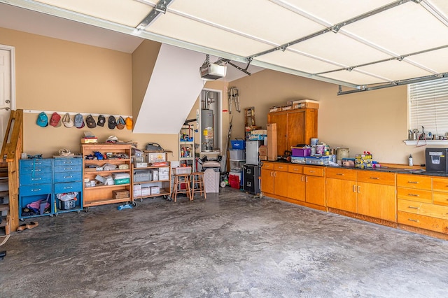 8337 Kayla Rose Cir, Ooltewah, TN 37363 - garage with gas water heater and a garage door opener