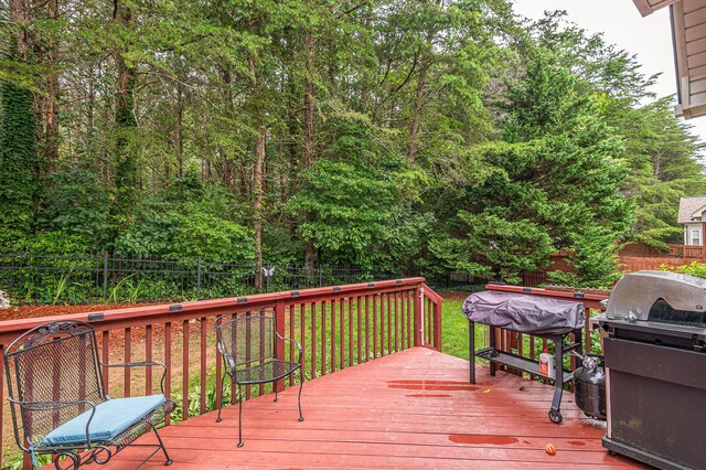 8337 Kayla Rose Cir, Ooltewah, TN 37363 - wooden terrace with a fenced backyard and a grill