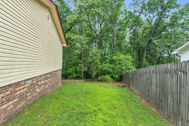 view of yard with fence