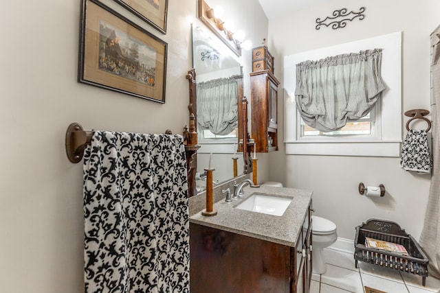 204 Lee-Gordon Mill Rd, Chickamauga, GA 30707 - bathroom with toilet, vanity, tile patterned floors, and baseboards