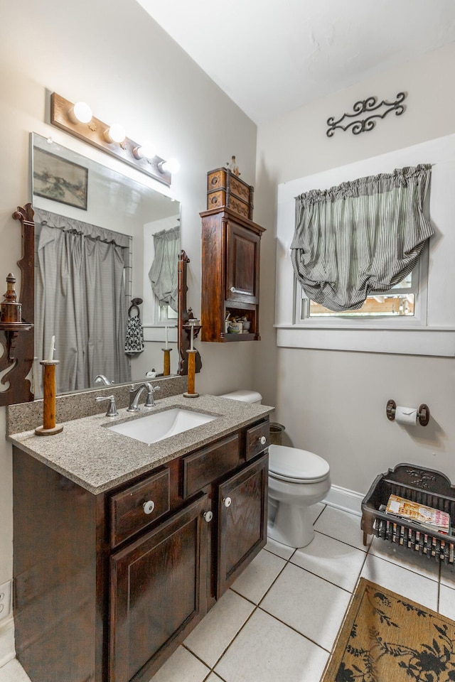 204 Lee-Gordon Mill Rd, Chickamauga, GA 30707 - bathroom featuring tile patterned flooring, toilet, and vanity