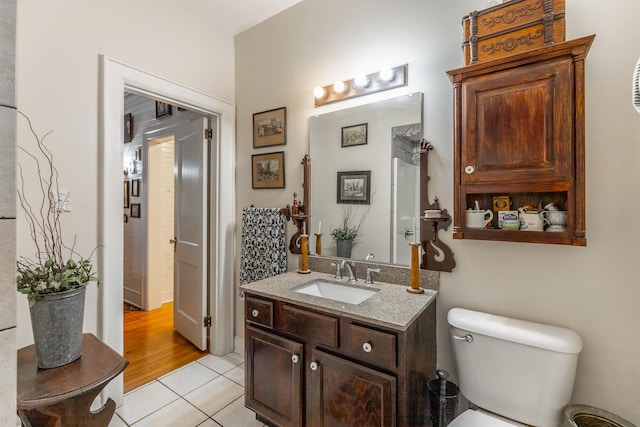 204 Lee-Gordon Mill Rd, Chickamauga, GA 30707 - bathroom featuring tile patterned floors, toilet, and vanity