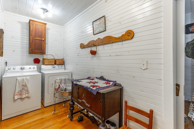 204 Lee-Gordon Mill Rd, Chickamauga, GA 30707 - clothes washing area featuring separate washer and dryer, cabinet space, light wood-style flooring, wood walls, and wood ceiling
