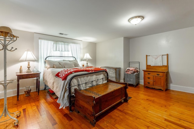204 Lee-Gordon Mill Rd, Chickamauga, GA 30707 - bedroom featuring light wood-style flooring and baseboards