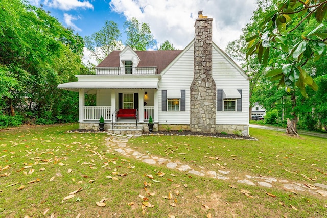 204 Lee-Gordon Mill Rd, Chickamauga, GA 30707 - view of front of property featuring a porch, a balcony, a front yard, and a chimney