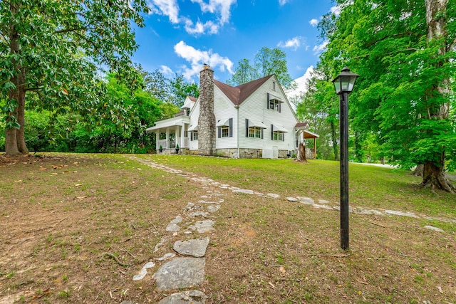 204 Lee-Gordon Mill Rd, Chickamauga, GA 30707 - view of property exterior featuring a chimney and a lawn