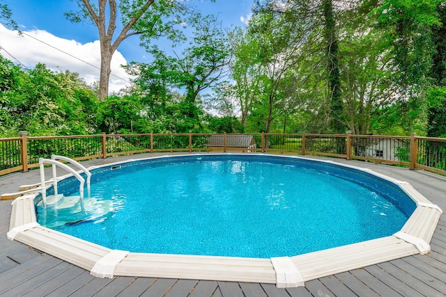 204 Lee-Gordon Mill Rd, Chickamauga, GA 30707 - swimming pool with a wooden deck and view of scattered trees