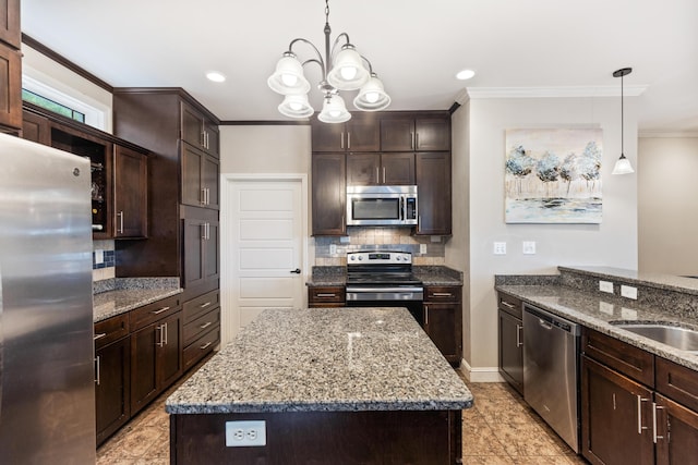 kitchen with stainless steel appliances, ornamental molding, tasteful backsplash, and dark brown cabinets