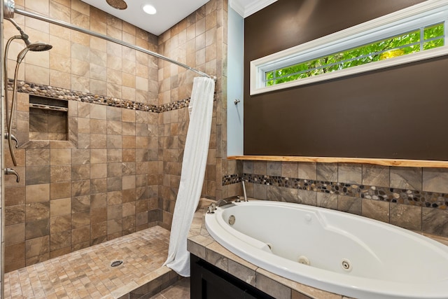 bathroom with a jetted tub and a shower stall