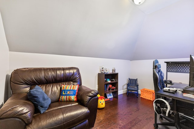 office space with vaulted ceiling and wood finished floors