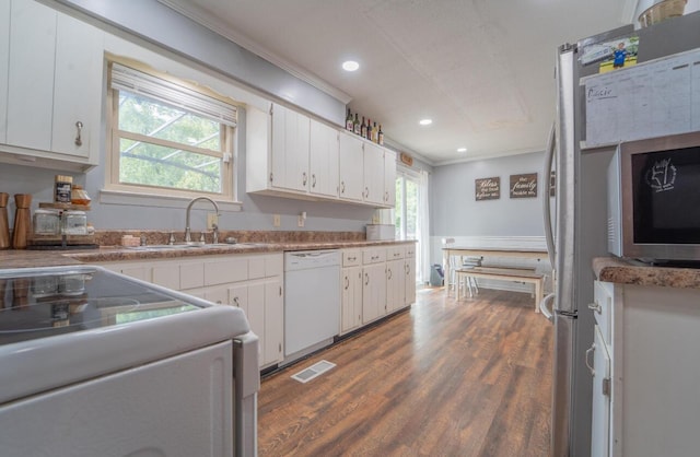 kitchen featuring dishwasher, white cabinets, a sink, dark wood finished floors, and range