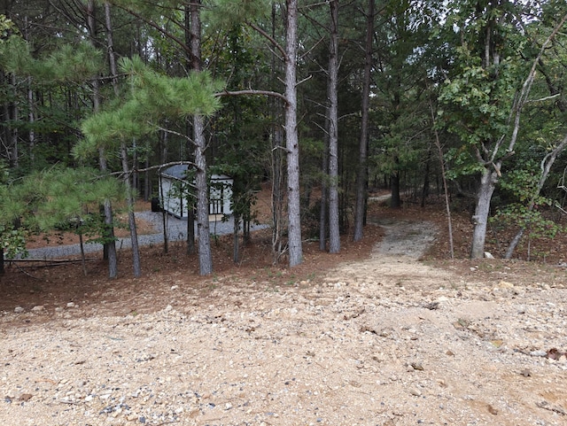 exterior space featuring a view of trees