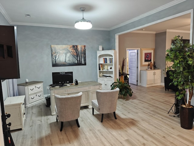 office area featuring crown molding, baseboards, and light wood-style floors