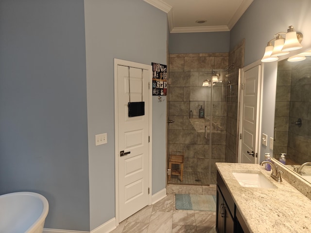 full bathroom with a freestanding tub, a shower stall, vanity, baseboards, and ornamental molding