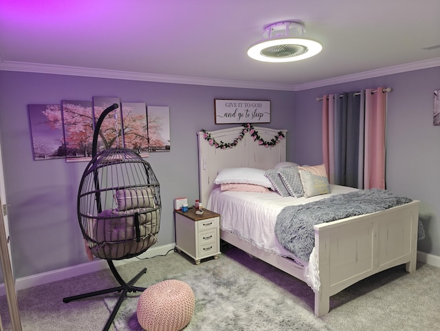 bedroom featuring baseboards, ornamental molding, and carpet flooring