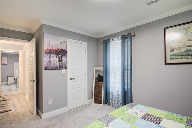 bedroom featuring ornamental molding, light carpet, and visible vents
