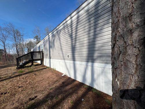 401 Old Cottonwood Mill Rd, Tunnel Hill, GA 30755 - view of side of home with stairs