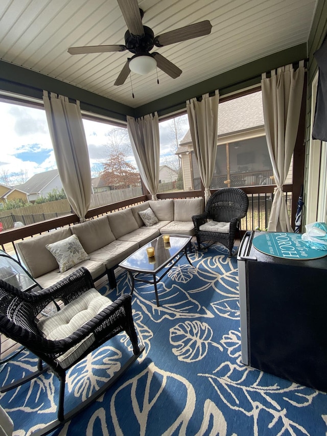 exterior space featuring ceiling fan