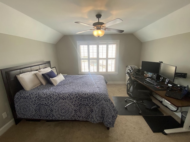 bedroom with ceiling fan, lofted ceiling, carpet, and baseboards