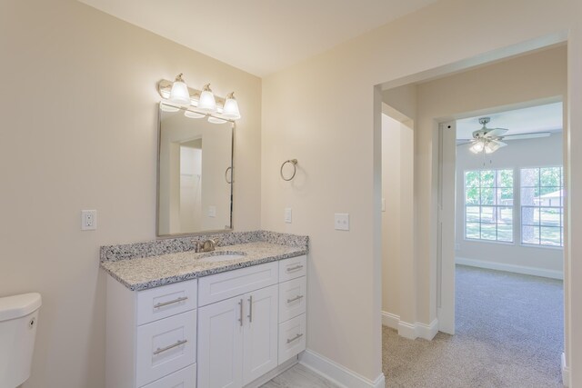229 General Thomas St, Chickamauga, GA 30707 - bathroom featuring ceiling fan, vanity, toilet, and baseboards