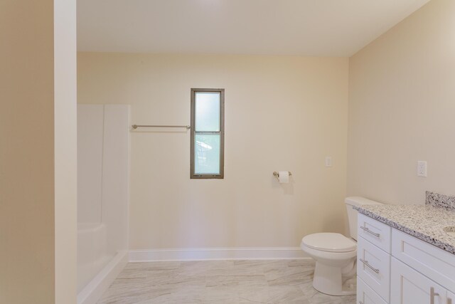 229 General Thomas St, Chickamauga, GA 30707 - bathroom with marble look tiles, vanity, toilet, a shower, and baseboards