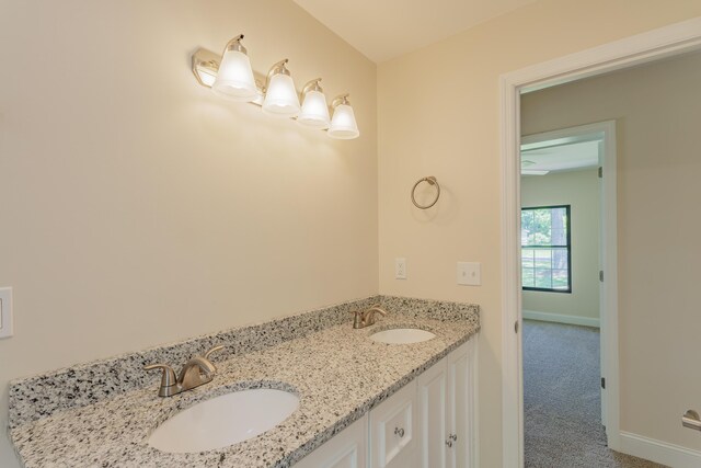 229 General Thomas St, Chickamauga, GA 30707 - bathroom featuring double vanity and baseboards