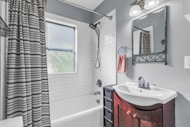 bathroom with vanity and shower / tub combo