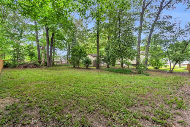 view of yard featuring fence