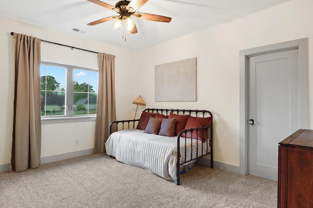 bedroom featuring carpet flooring, baseboards, and visible vents