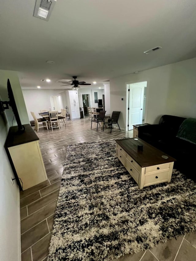 5561 River Rd, Decatur, TN 37322 - living room with a ceiling fan, recessed lighting, and dark wood finished floors