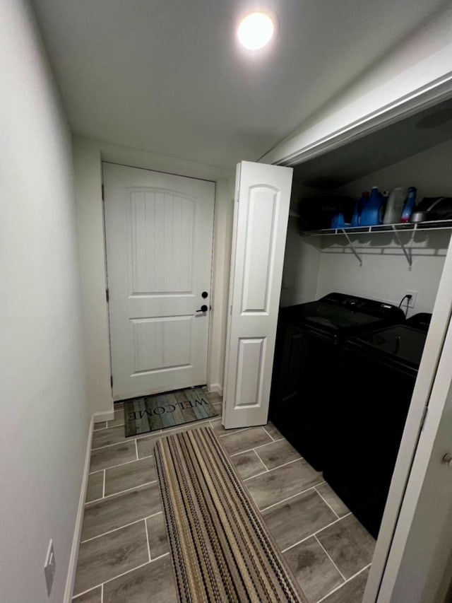 5561 River Rd, Decatur, TN 37322 - washroom featuring independent washer and dryer, wood finish floors, and baseboards