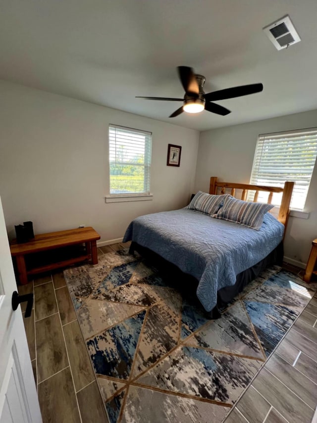 5561 River Rd, Decatur, TN 37322 - bedroom featuring wood tiled floors, ceiling fan, and baseboards