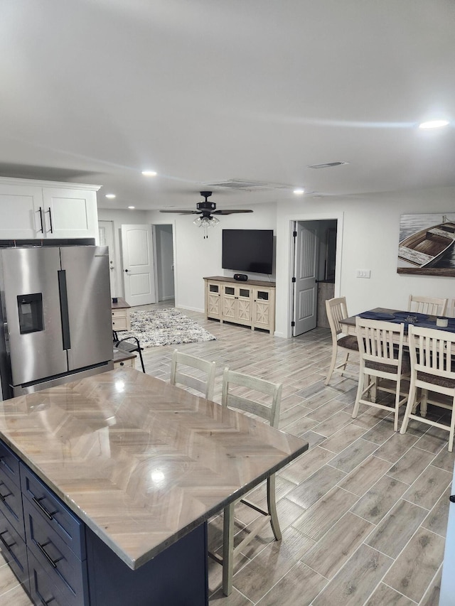 5561 River Rd, Decatur, TN 37322 - living area with light wood-type flooring, ceiling fan, baseboards, and recessed lighting