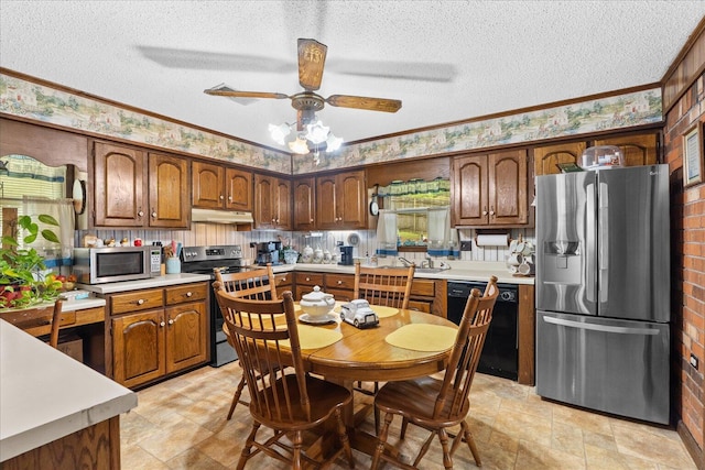 4042 Village Dr, Cohutta, GA 30710 - kitchen with a ceiling fan, stainless steel appliances, a textured ceiling, under cabinet range hood, and light countertops