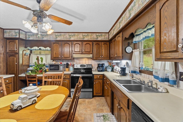 4042 Village Dr, Cohutta, GA 30710 - kitchen featuring a sink, stainless steel appliances, a textured ceiling, under cabinet range hood, and light countertops