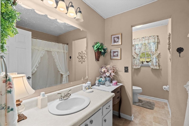 4042 Village Dr, Cohutta, GA 30710 - full bathroom featuring toilet, baseboards, and vanity
