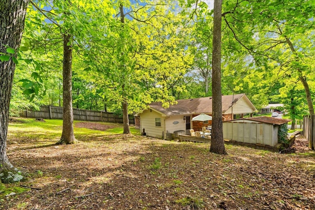 4042 Village Dr, Cohutta, GA 30710 - view of yard with an outdoor structure, a shed, and fence