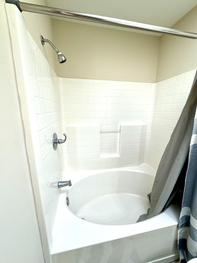 full bathroom with shower / bathtub combination with curtain