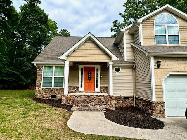 craftsman-style home featuring an attached garage, a front lawn, stone siding, and a shingled roof
