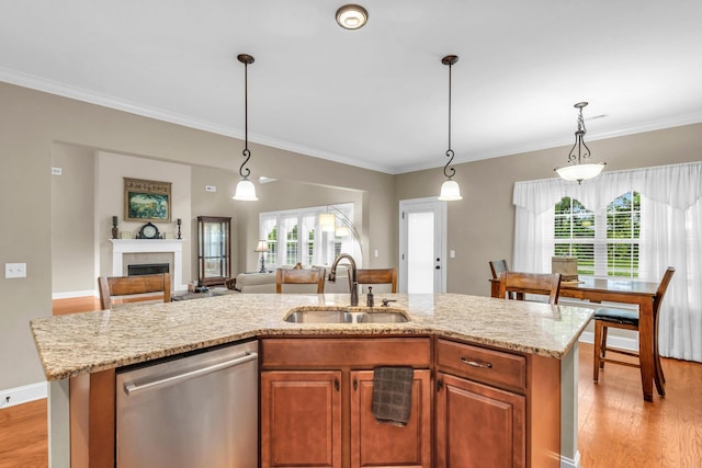 8358 Front Gate Cir, Ooltewah, TN 37363 - kitchen featuring dishwasher, a sink, plenty of natural light, light wood-style floors, and ornamental molding
