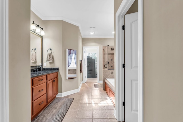 8358 Front Gate Cir, Ooltewah, TN 37363 - full bathroom featuring a shower stall, tile patterned flooring, crown molding, vanity, and baseboards