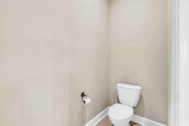8358 Front Gate Cir, Ooltewah, TN 37363 - bathroom featuring baseboards and toilet