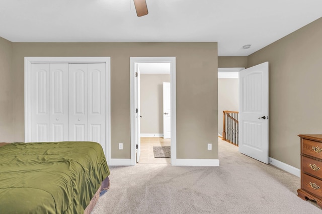 8358 Front Gate Cir, Ooltewah, TN 37363 - carpeted bedroom featuring baseboards, a closet, and a ceiling fan