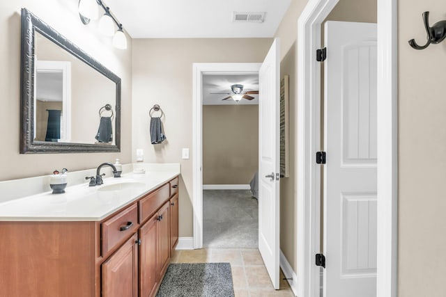 8358 Front Gate Cir, Ooltewah, TN 37363 - bathroom with ceiling fan, vanity, baseboards, and tile patterned floors