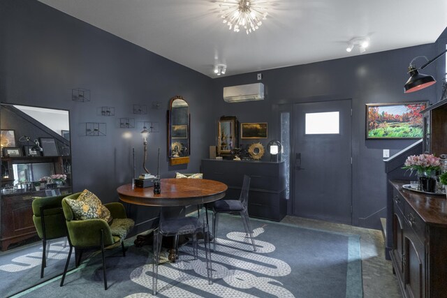 dining space featuring a wall mounted air conditioner and a chandelier