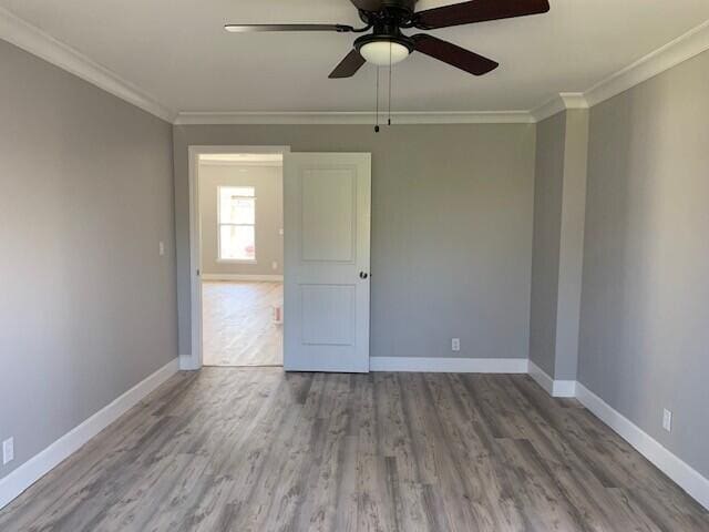 3113 10th Ave, Chattanooga, TN 37407 - empty room featuring crown molding, ceiling fan, and wood finished floors