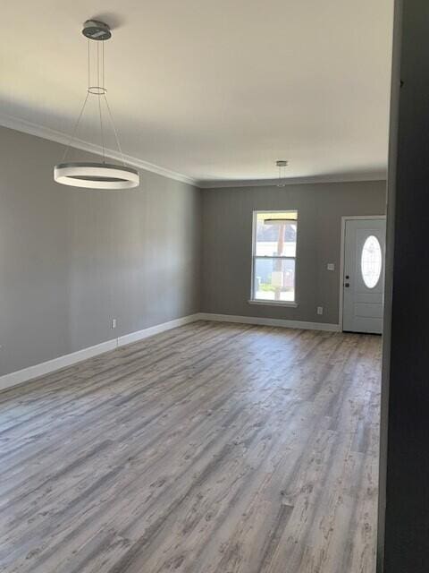 3113 10th Ave, Chattanooga, TN 37407 - empty room with ornamental molding and wood finished floors