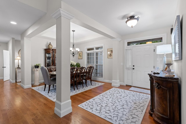 212 Smith St, Signal Mountain, TN 37377 - foyer with a chandelier, decorative columns, wood finished floors, and recessed lighting